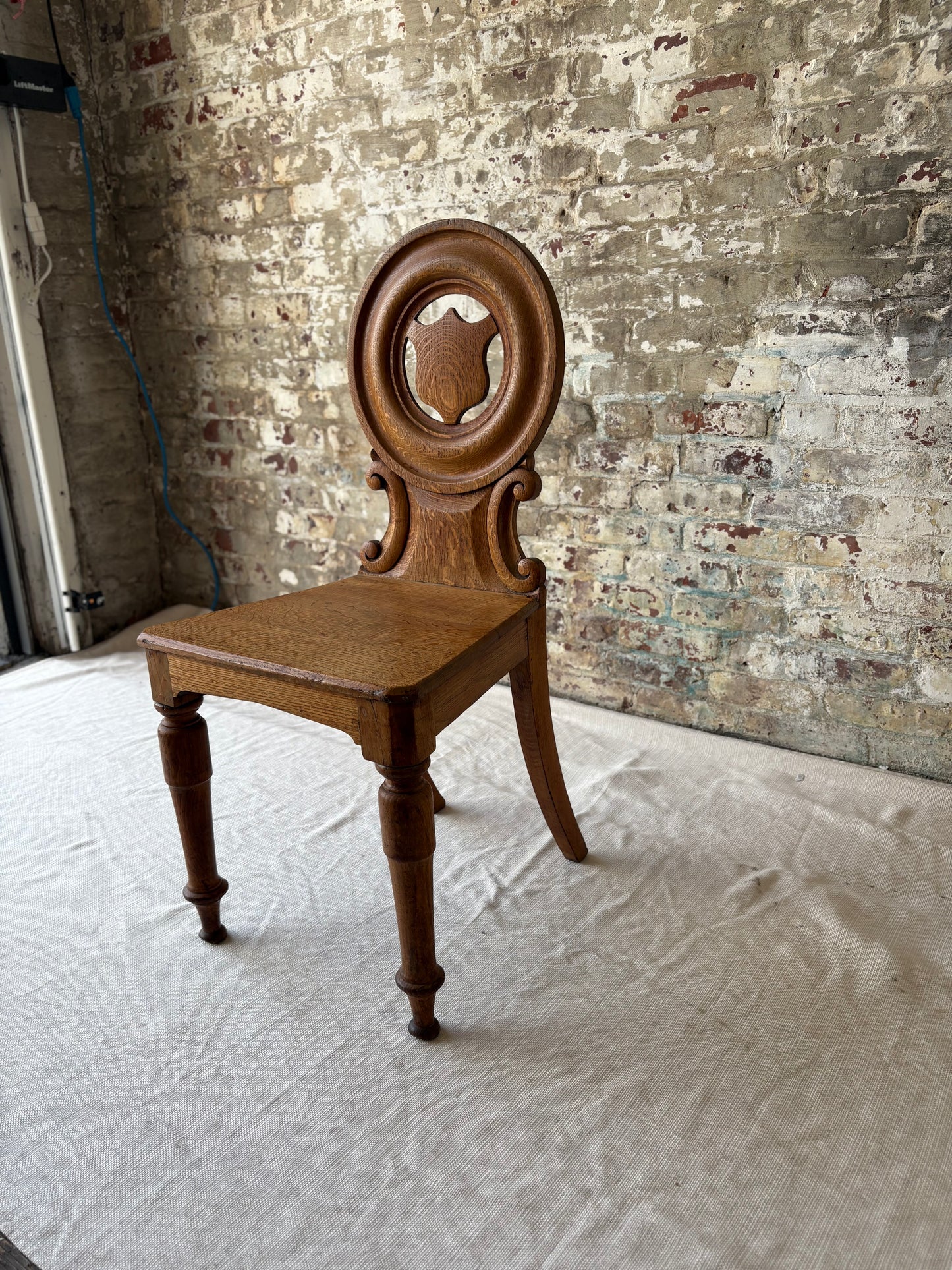 19th-Century Carved Oak Side Chair – Shield Back with Sculptural Detail