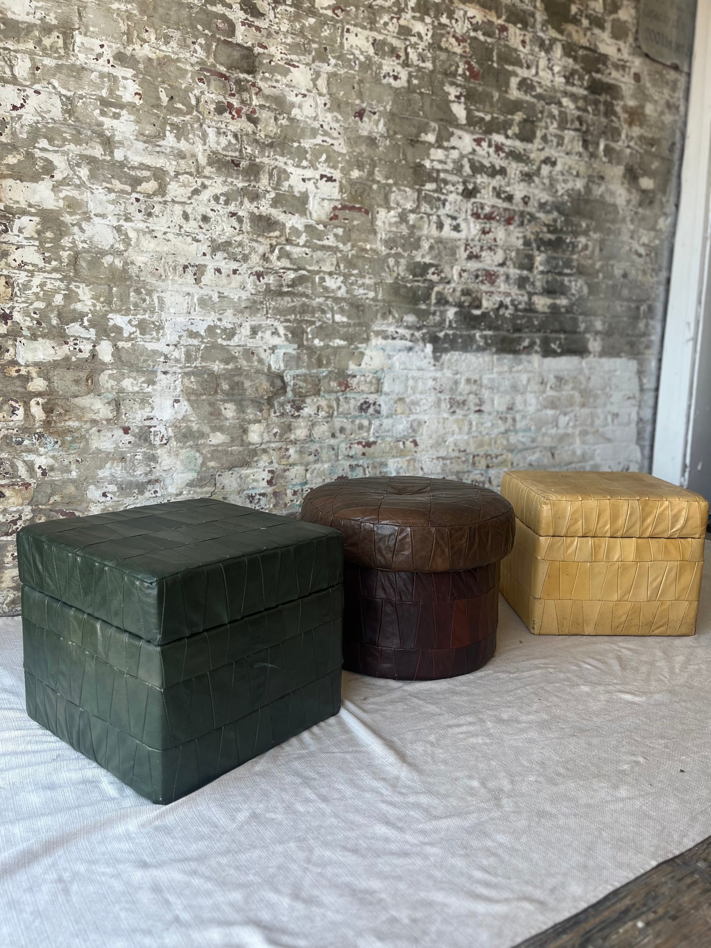 3 Leather Ottomans