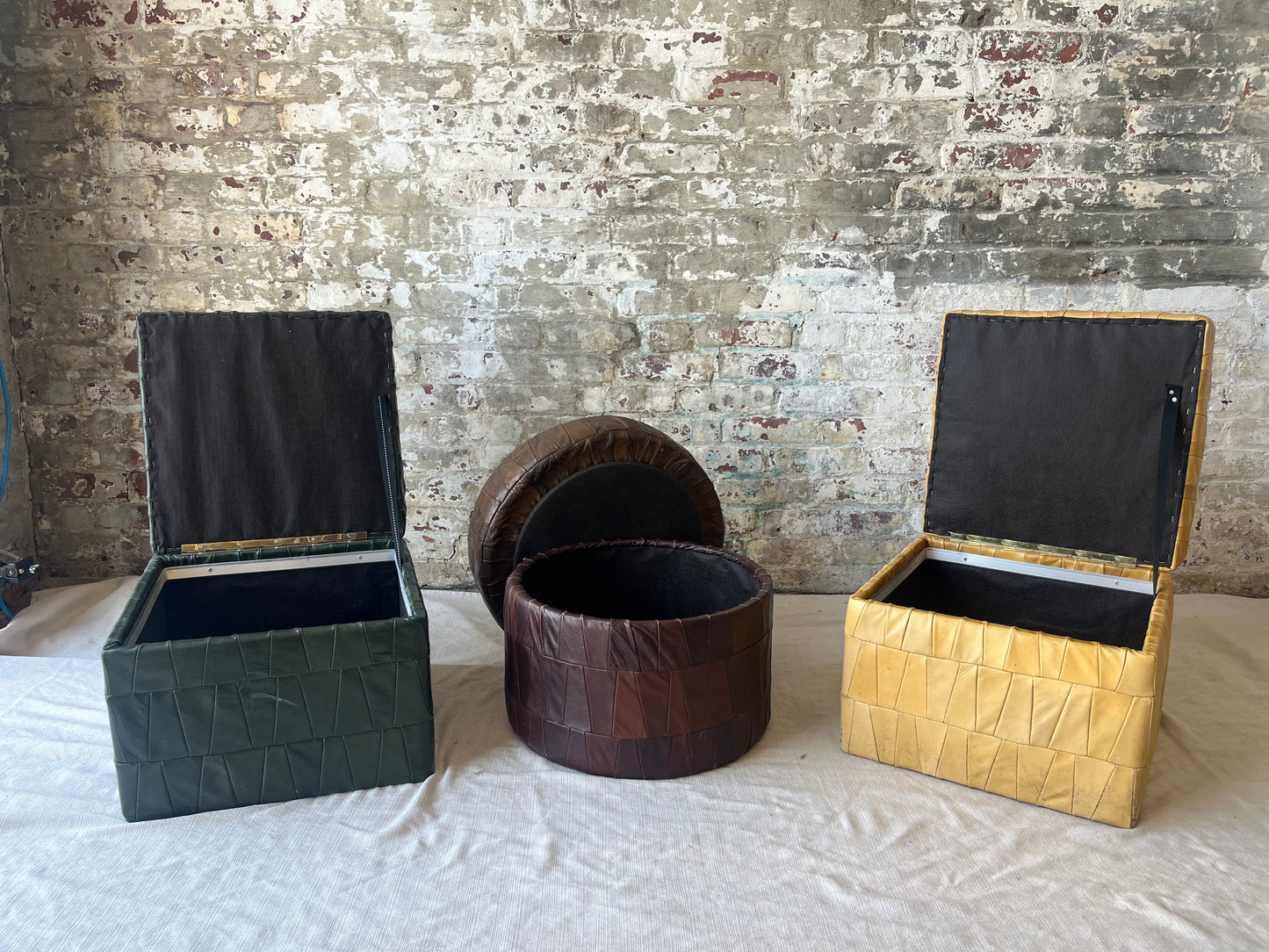 3 Leather Ottomans