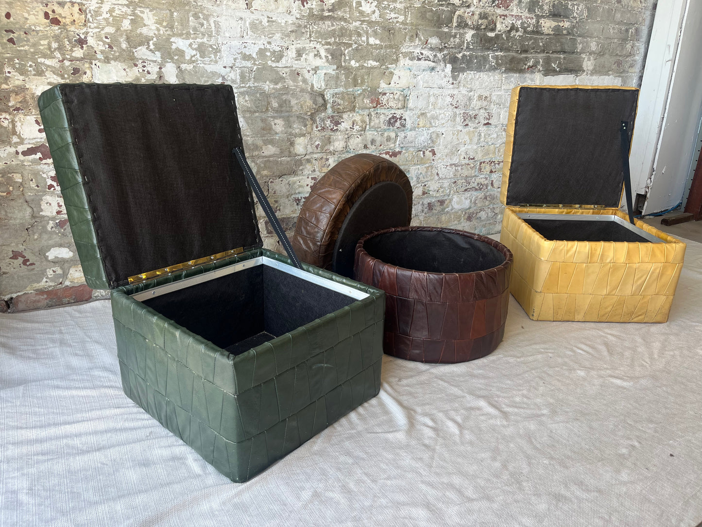 3 Leather Ottomans