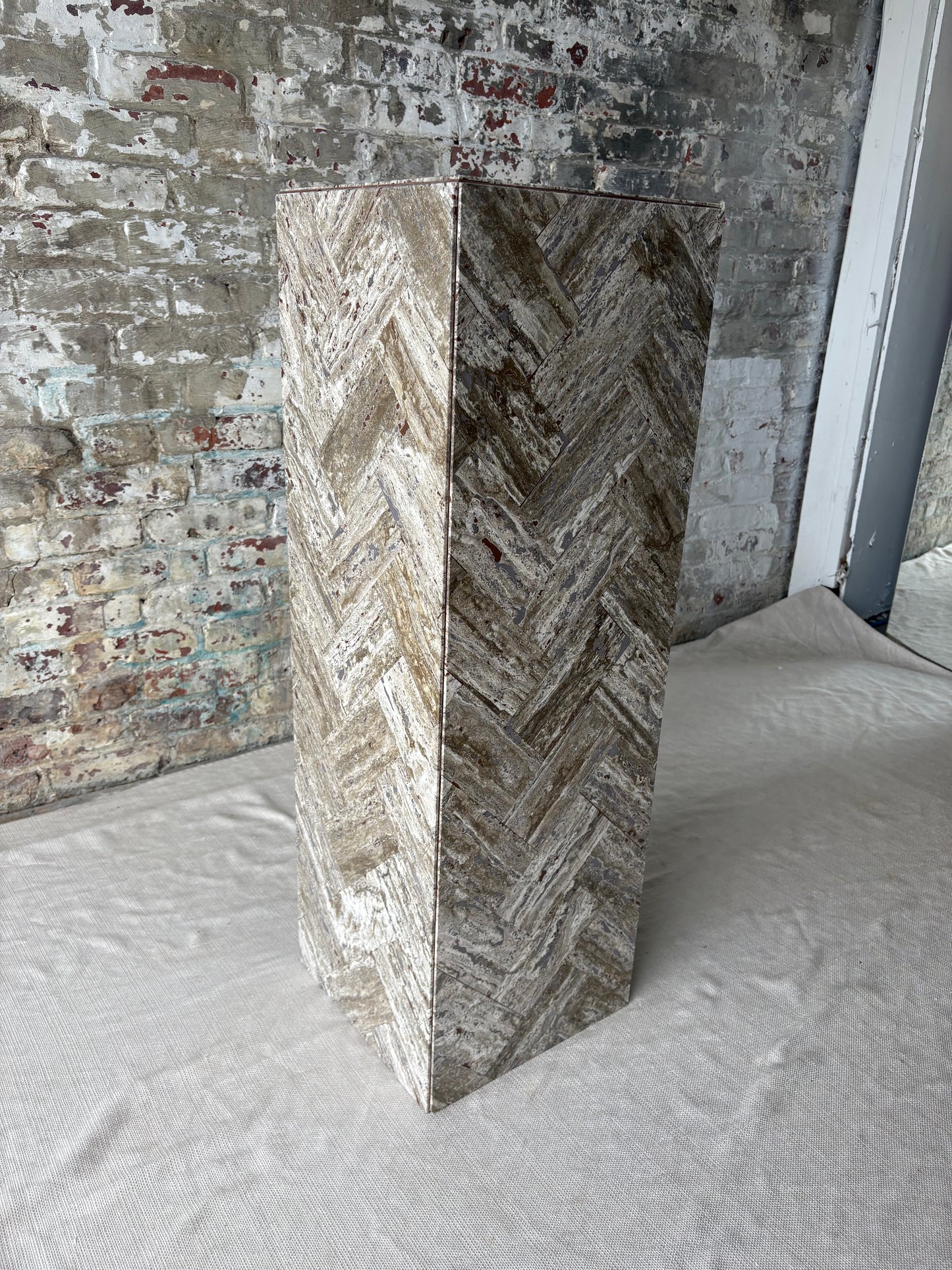 Gray Stone Herringbone Pedestal with Sculptural Geometric Inlay