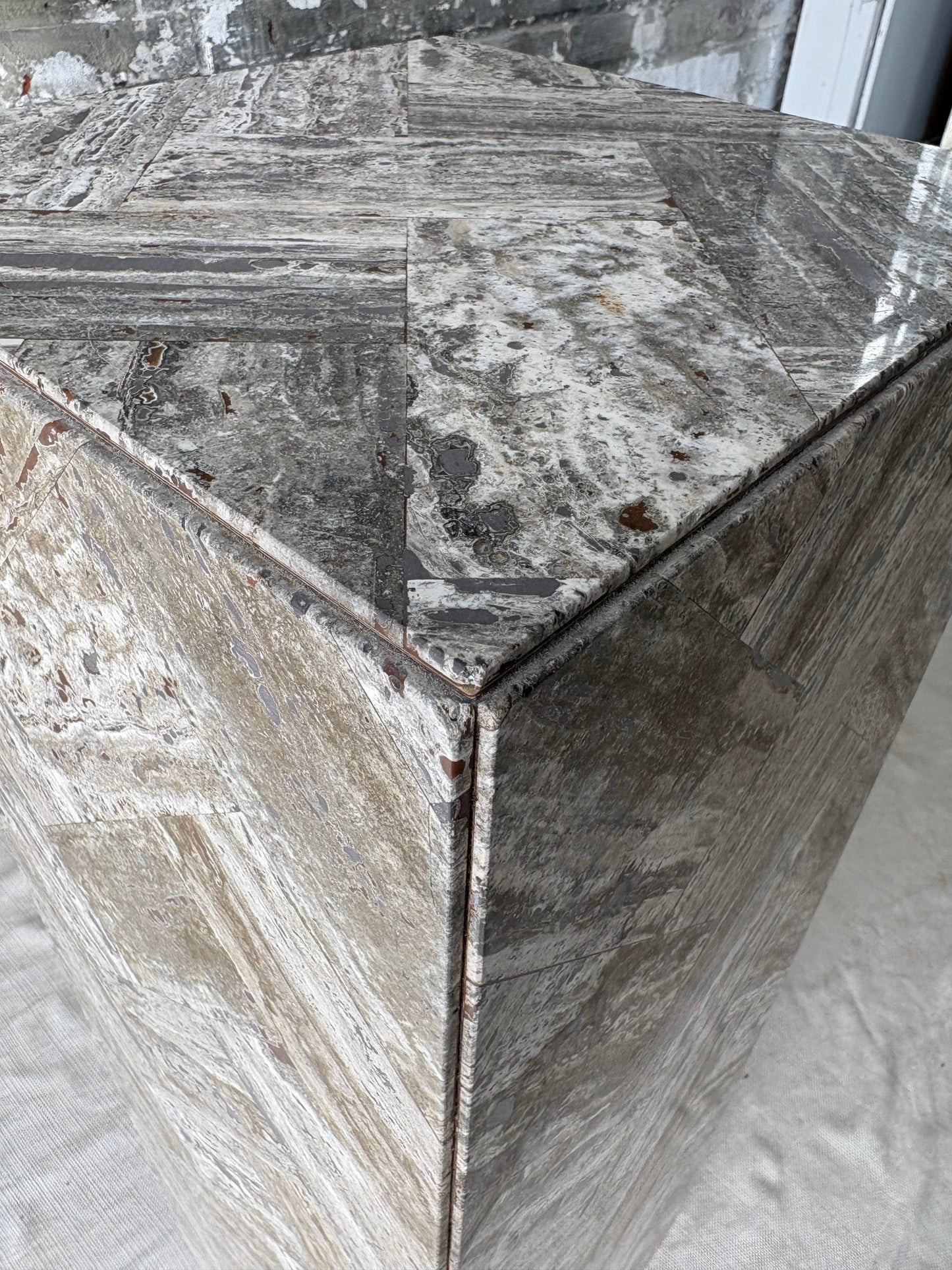Gray Stone Herringbone Pedestal with Sculptural Geometric Inlay