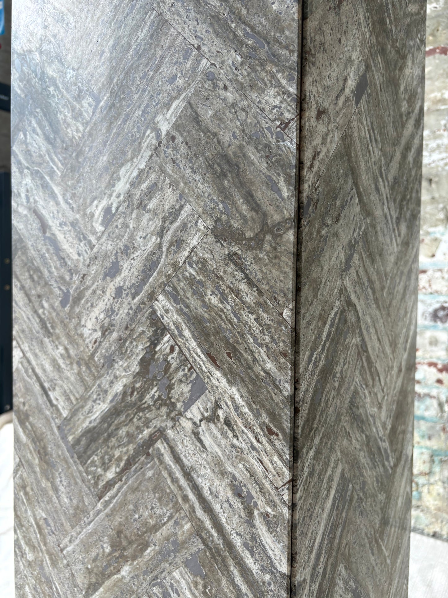Gray Stone Herringbone Pedestal with Sculptural Geometric Inlay