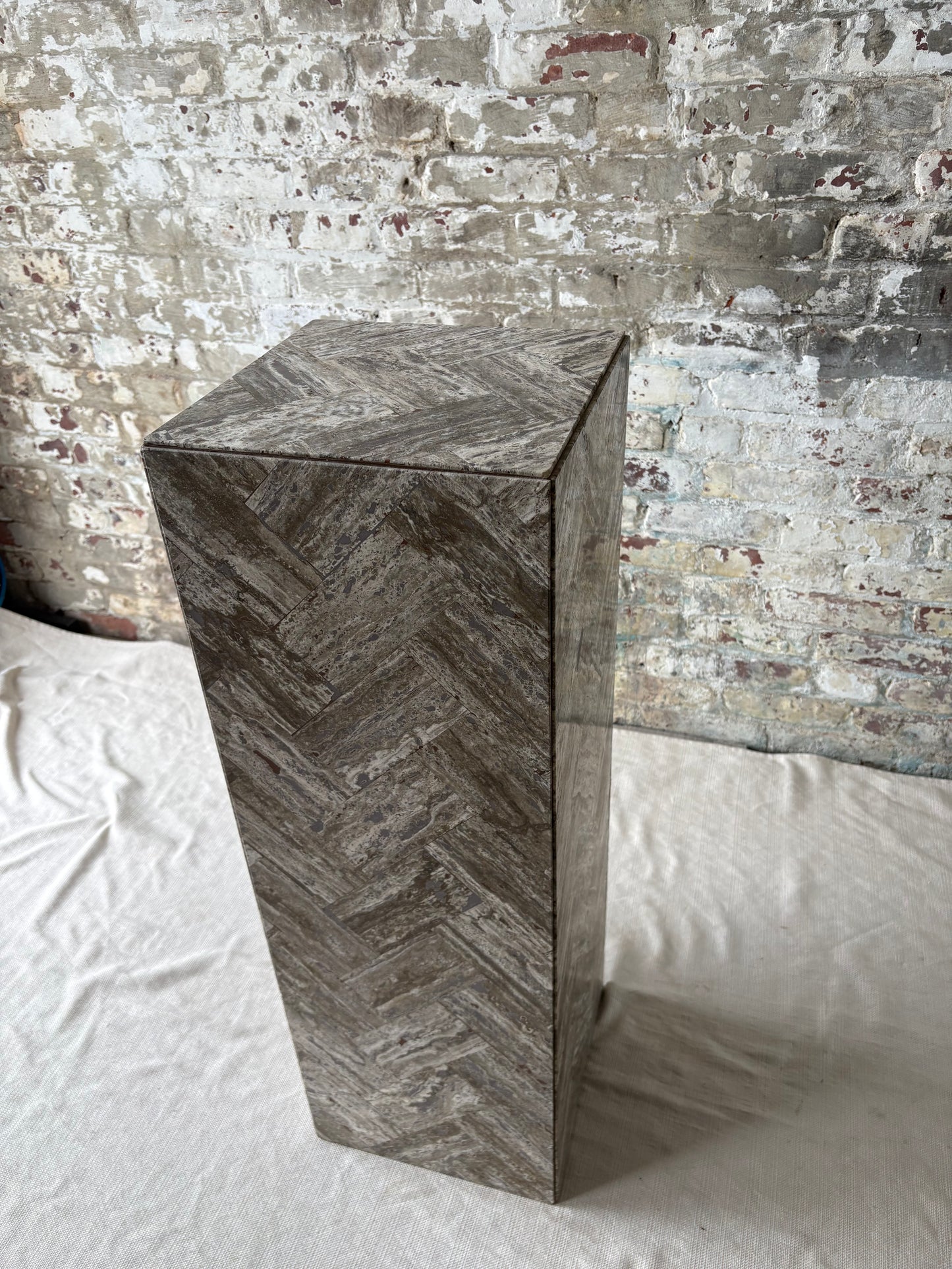Gray Stone Herringbone Pedestal with Sculptural Geometric Inlay